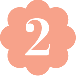 Peach flower-shaped badge with the number 2 in white.