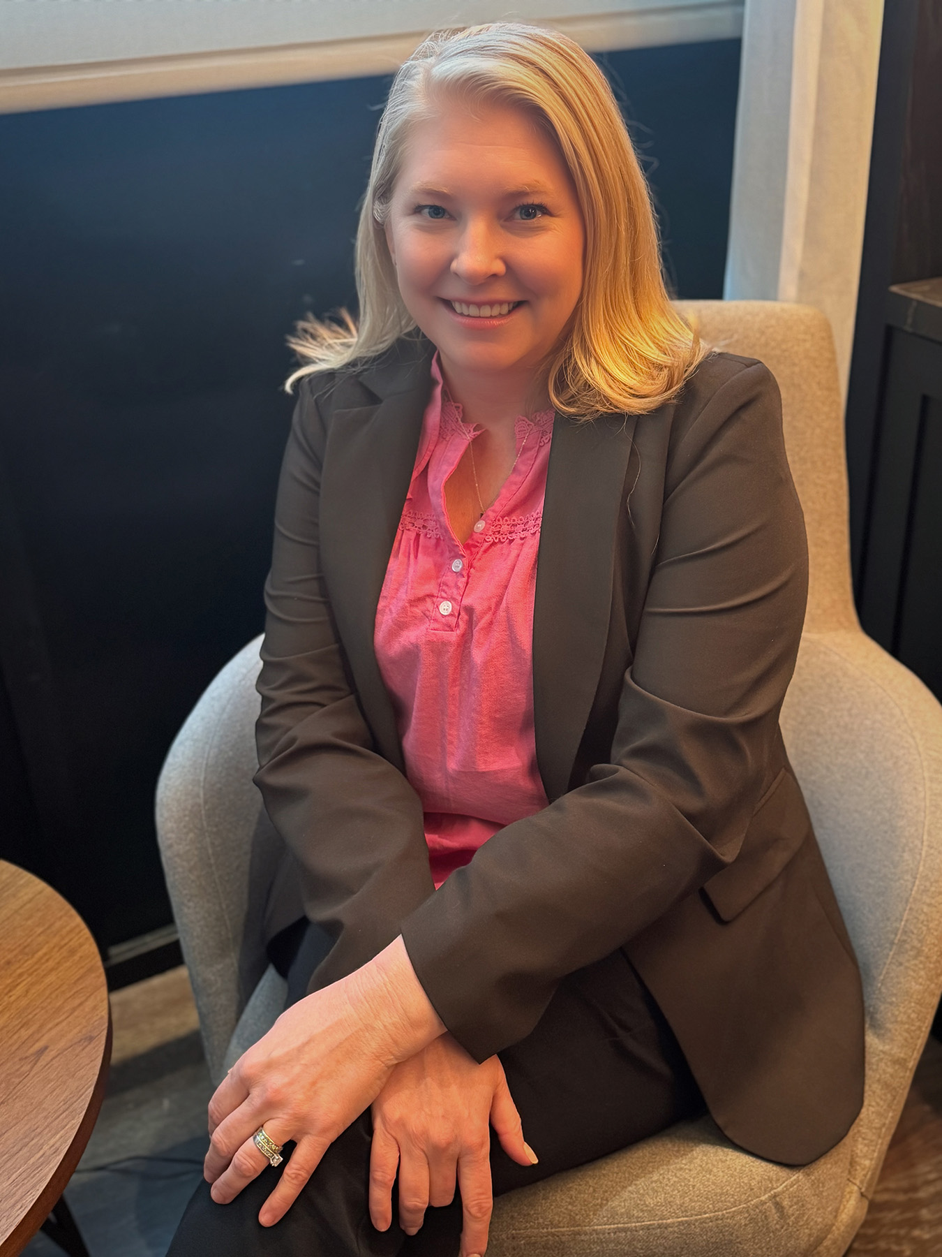 Allison hale owner of practice perfect seated in office providing expert practice management consulting services
